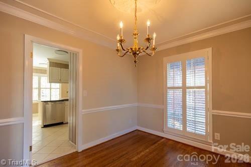 1405 Lyndhurst Drive High Point, NC 27262 - Photo 7 of 40 wooden floor in an empty room with a window