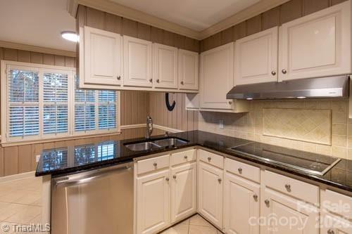 1405 Lyndhurst Drive High Point, NC 27262 - Photo 9 of 40 a kitchen with granite countertop white cabinets and white appliances