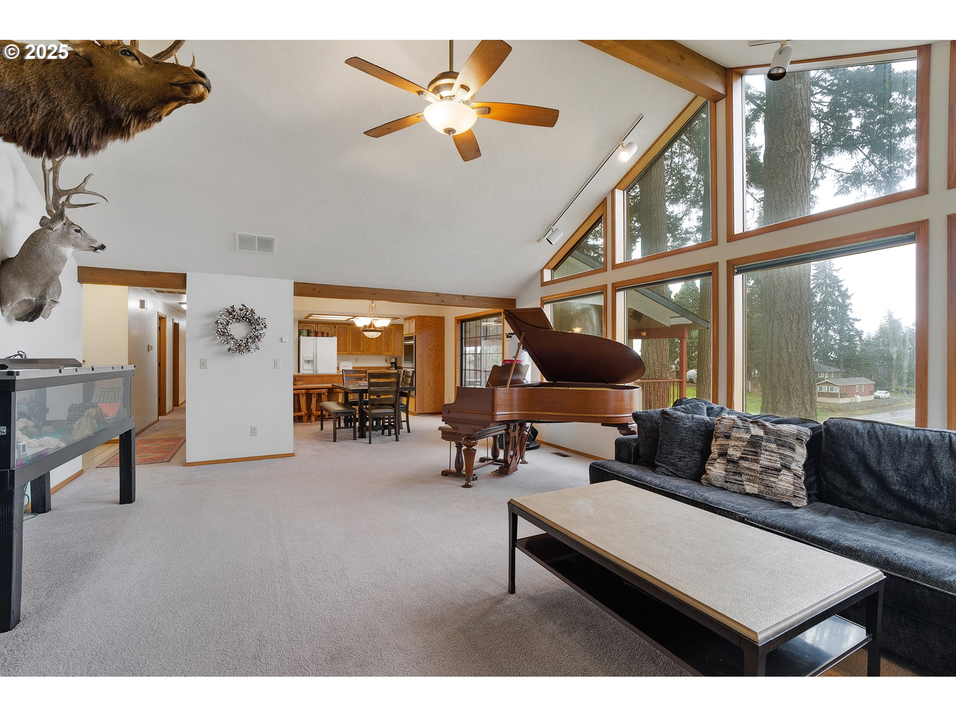 14018 South Spangler Road Oregon City, OR 97045 - Photo 11 of 34 a living room with furniture and a large window