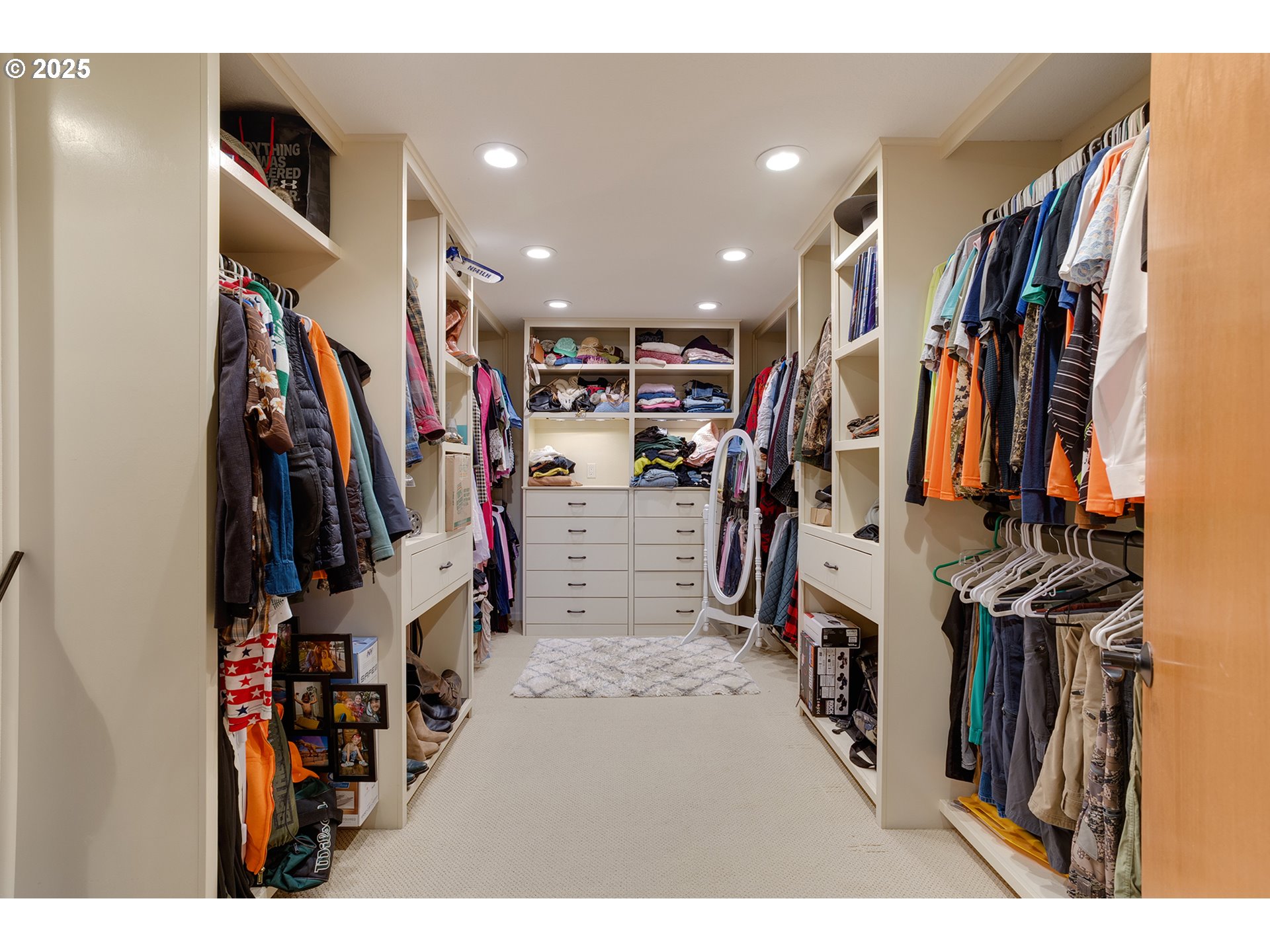 14018 South Spangler Road Oregon City, OR 97045 - Photo 22 of 34 a view of walk in closet with clothes