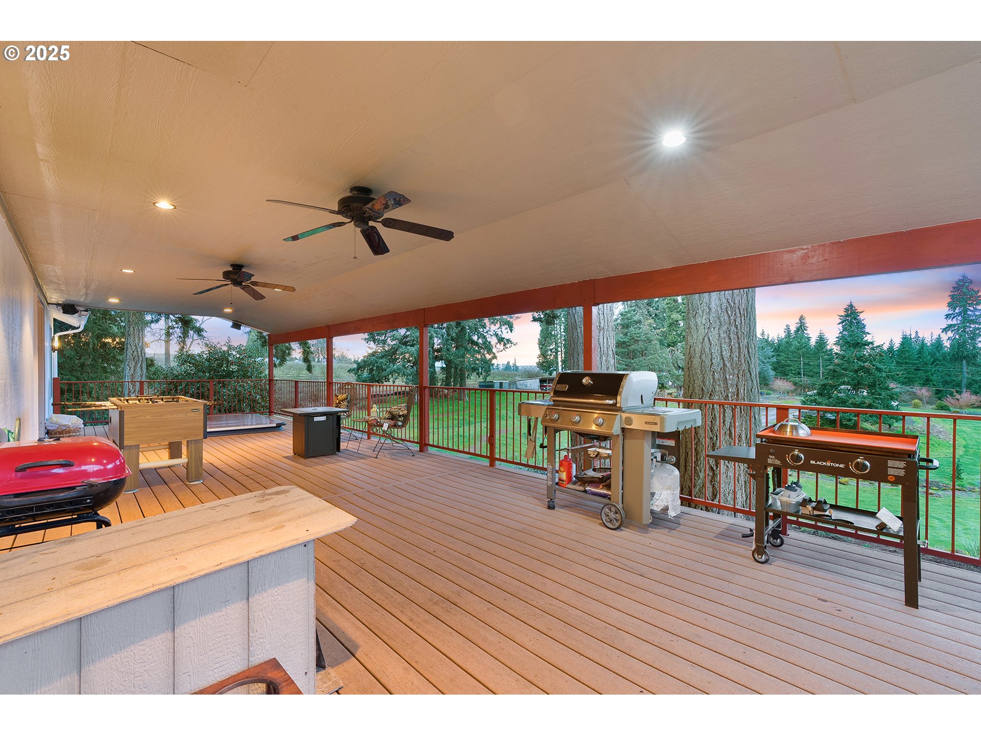 14018 South Spangler Road Oregon City, OR 97045 - Photo 24 of 34 a view of a patio with a table chairs and a patio