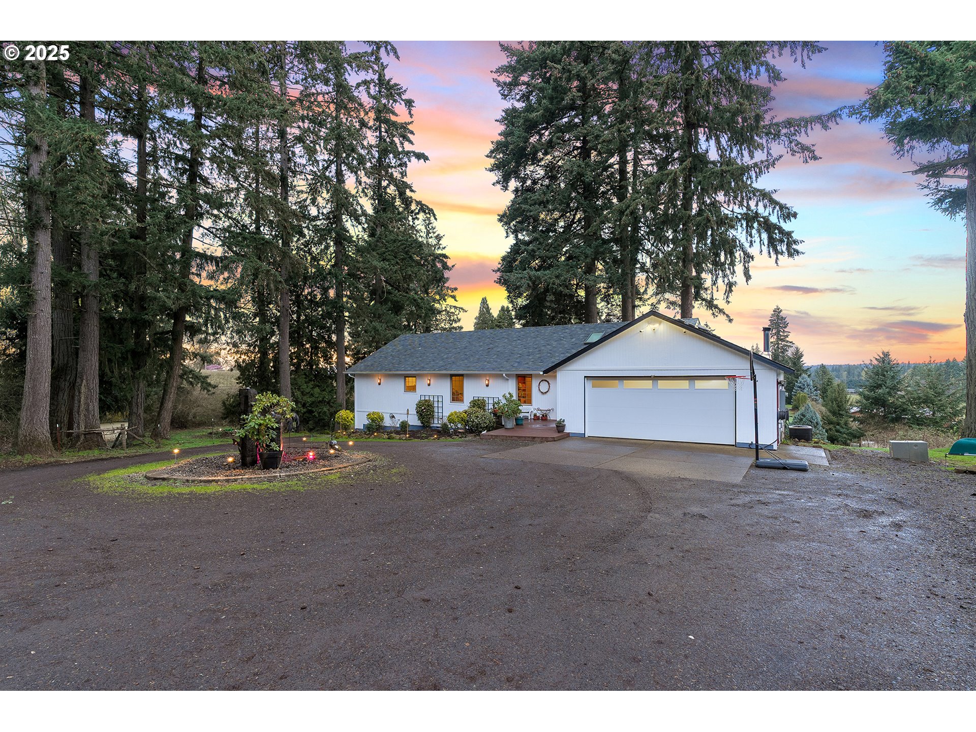 14018 South Spangler Road Oregon City, OR 97045 - Photo 3 of 34 a view of a house with a yard and garage