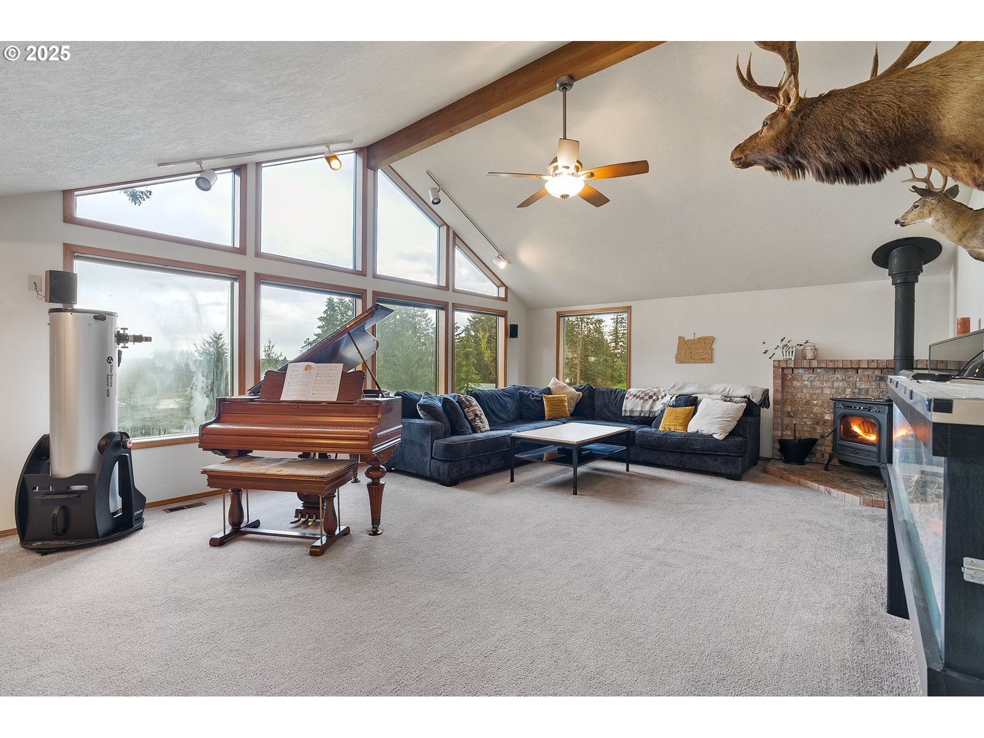 14018 South Spangler Road Oregon City, OR 97045 - Photo 10 of 34 a living room with furniture a rug and a large window