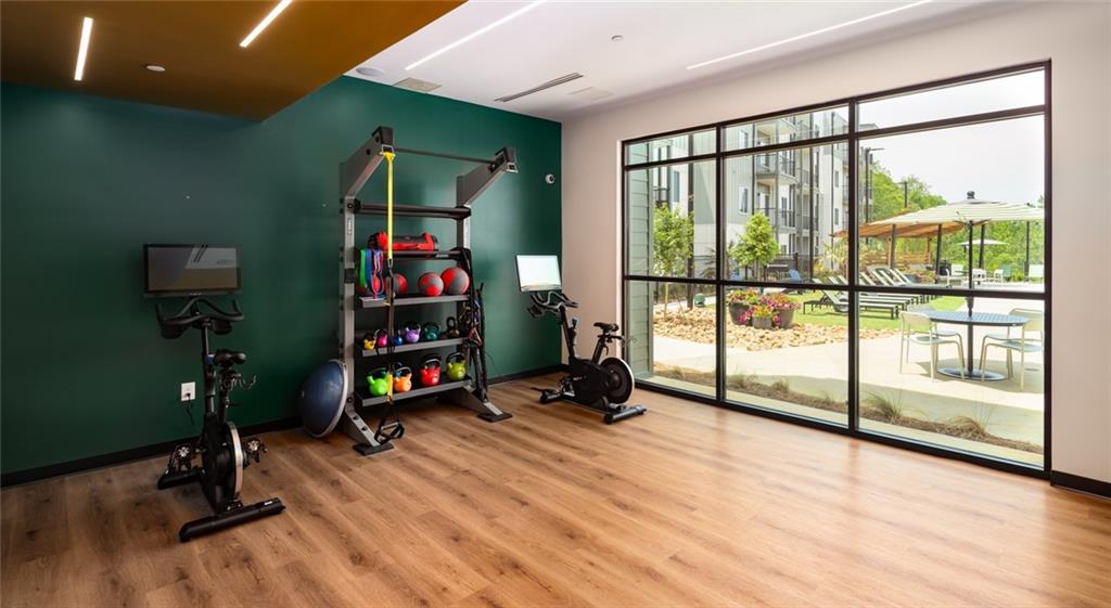 6000 Ava Avenue, Unit 4207 Gainesville, GA 30504 - Photo 33 of 34 a view of game room with window and gym equipment
