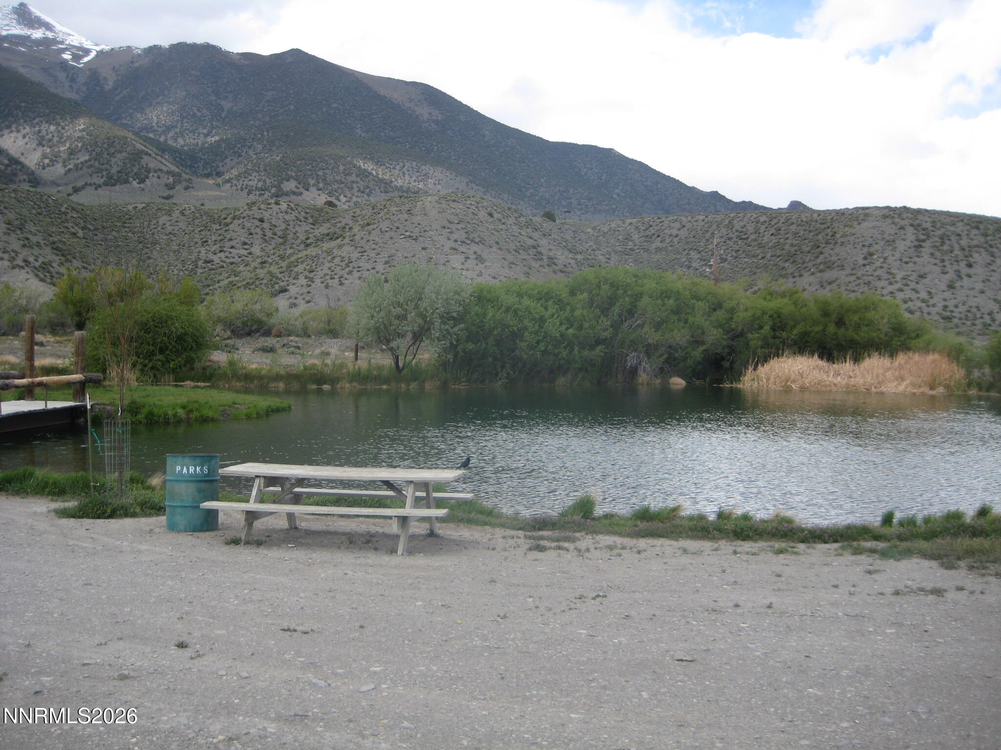 128 Canyon Circle Austin, NV 89310 - Photo 2 of 8 a view of a lake with mountain in the background