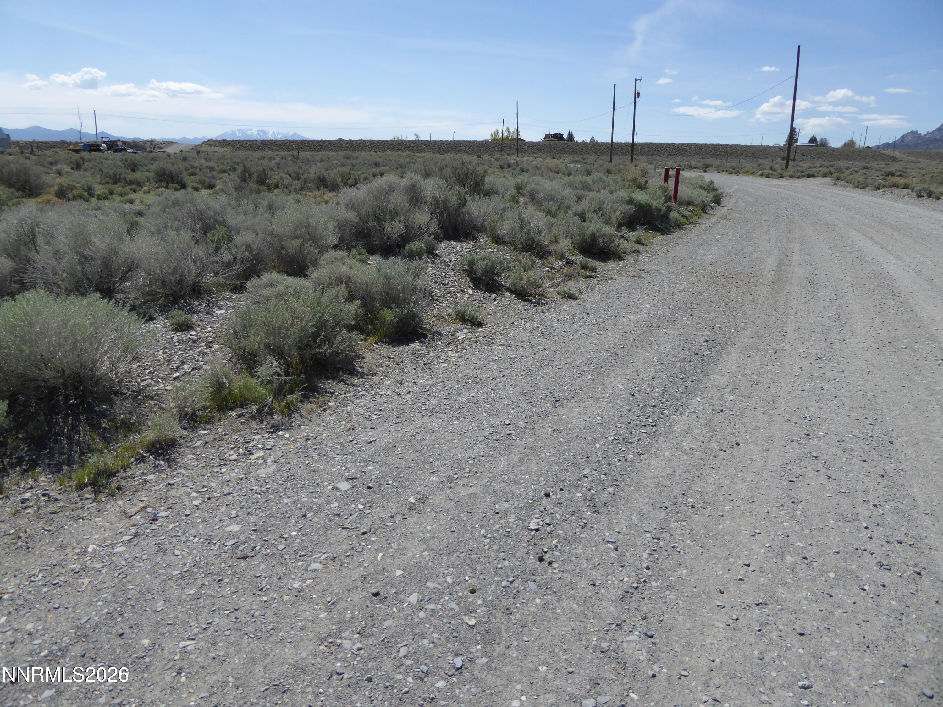 128 Canyon Circle Austin, NV 89310 - Photo 7 of 8 a view of a road with a yard