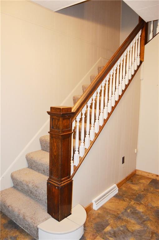 113 Riverside Drive Freeport, PA 16229 - Photo 10 of 25 Nice old/original newel post graces the entry. newer tile floor. Brand NEW Carpet.