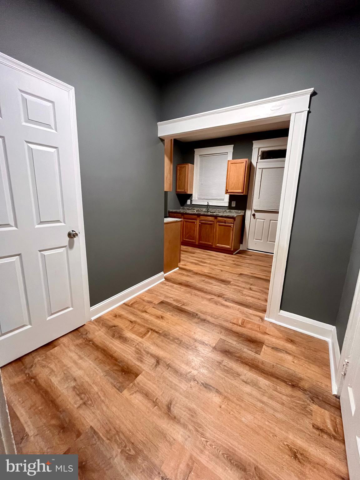 3343 Dudley Avenue Baltimore, MD 21213 - Photo 12 of 30 Hallway to bath, pantry, and Kitchen