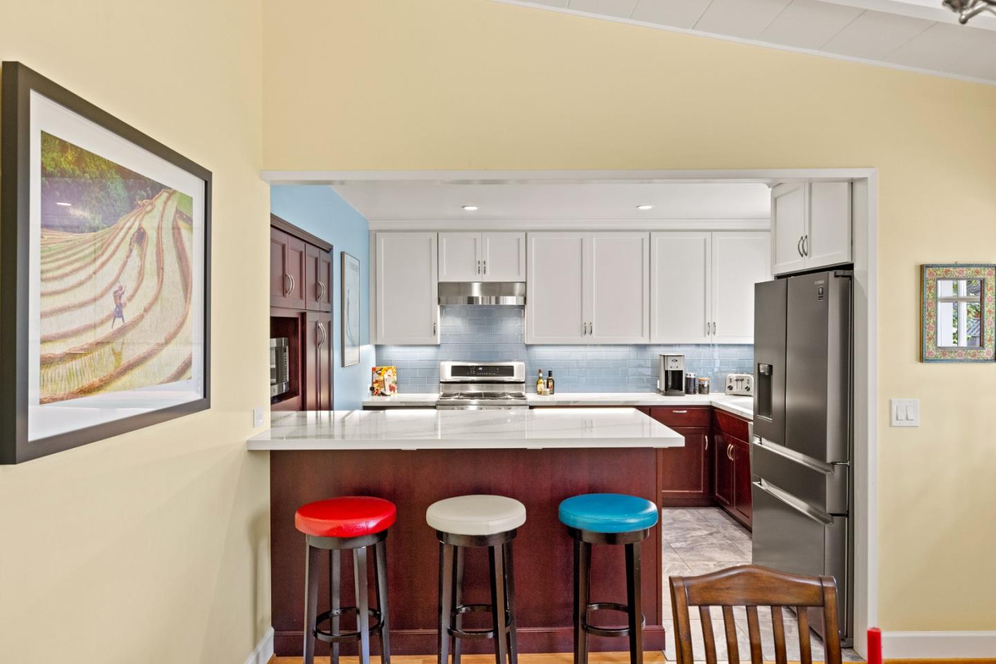 3532 Oliver Road Carmel, CA 93923 - Photo 14 of 47 a kitchen with stainless steel appliances granite countertop a sink refrigerator and cabinets