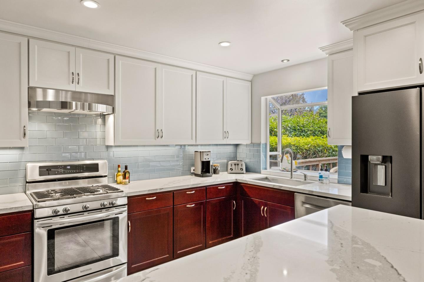 3532 Oliver Road Carmel, CA 93923 - Photo 16 of 47 a kitchen with a sink stove and refrigerator