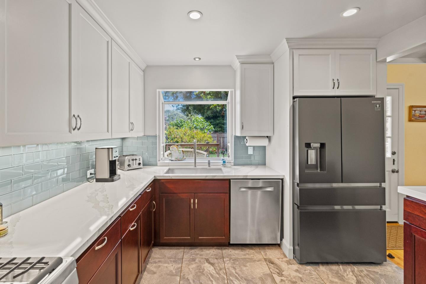 3532 Oliver Road Carmel, CA 93923 - Photo 17 of 47 a kitchen with a refrigerator sink and cabinets