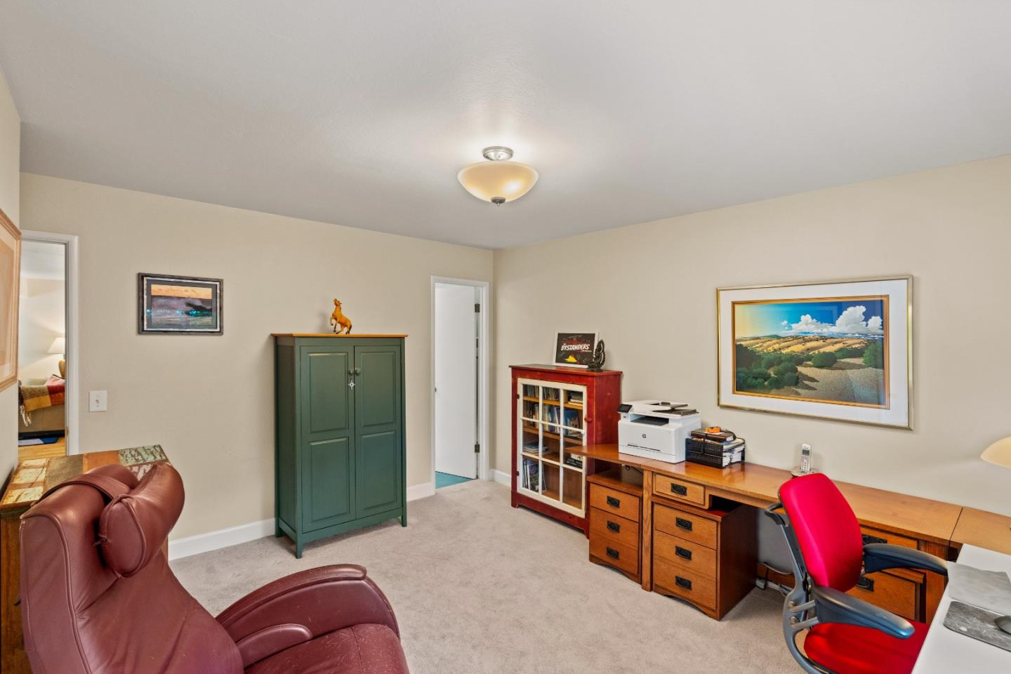 3532 Oliver Road Carmel, CA 93923 - Photo 25 of 47 a living room with furniture and a baby crib