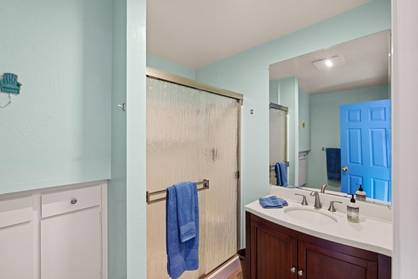 3532 Oliver Road Carmel, CA 93923 - Photo 32 of 47 a bathroom with a sink and a mirror