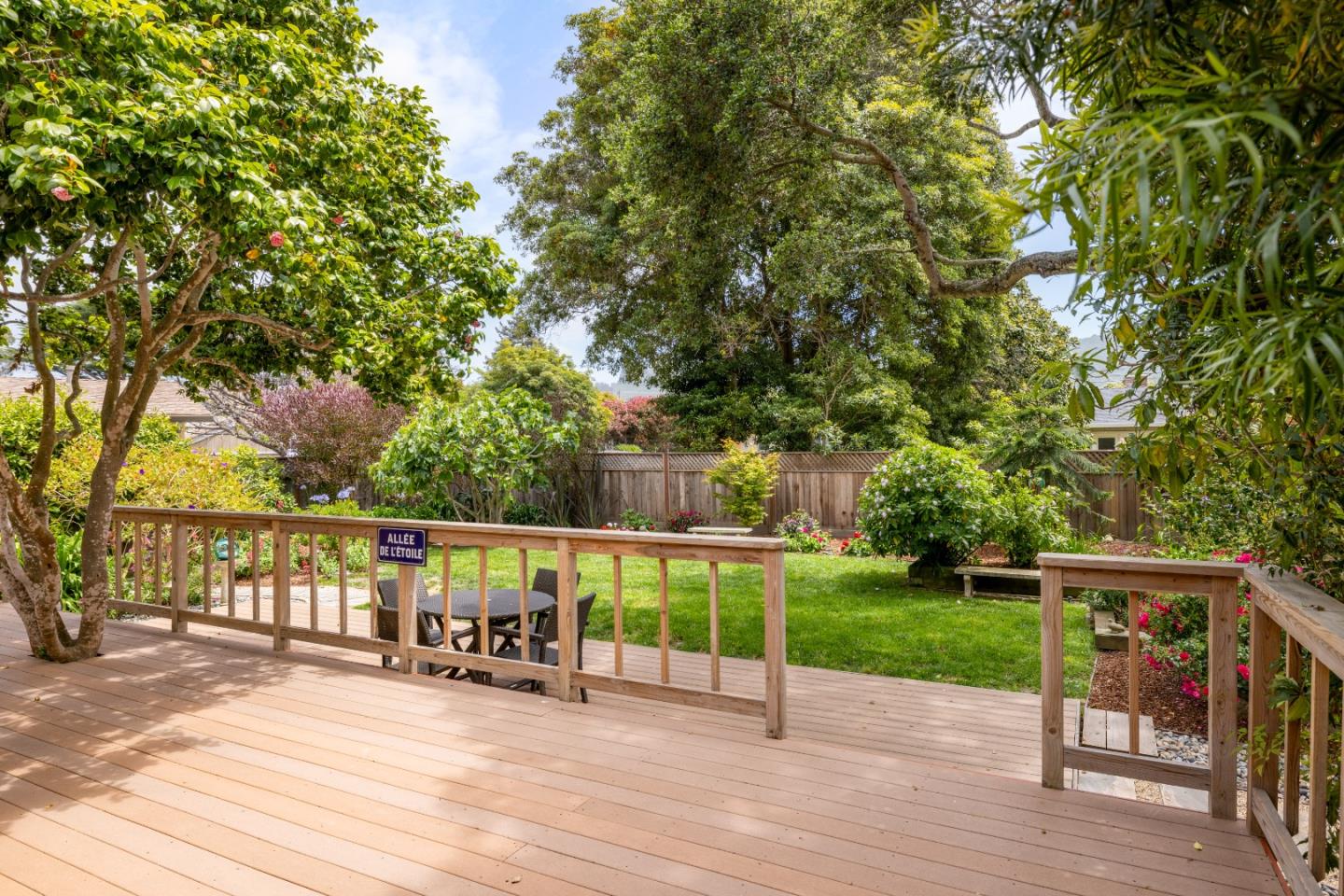 3532 Oliver Road Carmel, CA 93923 - Photo 33 of 47 a view of a deck with a table and chairs a barbeque with wooden floor and fence