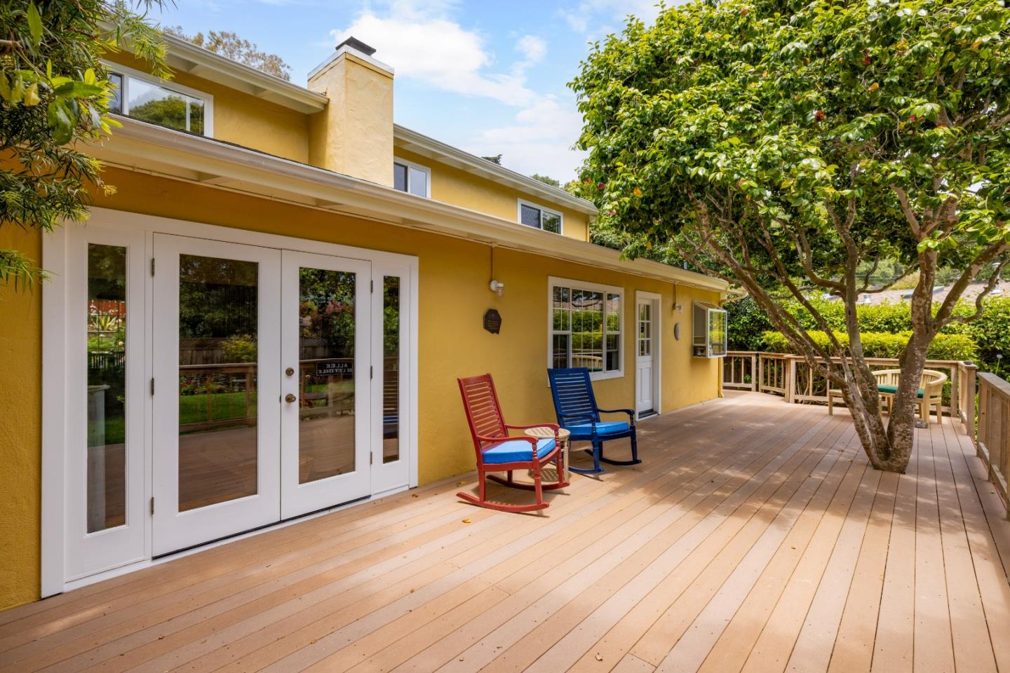 3532 Oliver Road Carmel, CA 93923 - Photo 35 of 47 a view of a patio with table and chairs and wooden floor