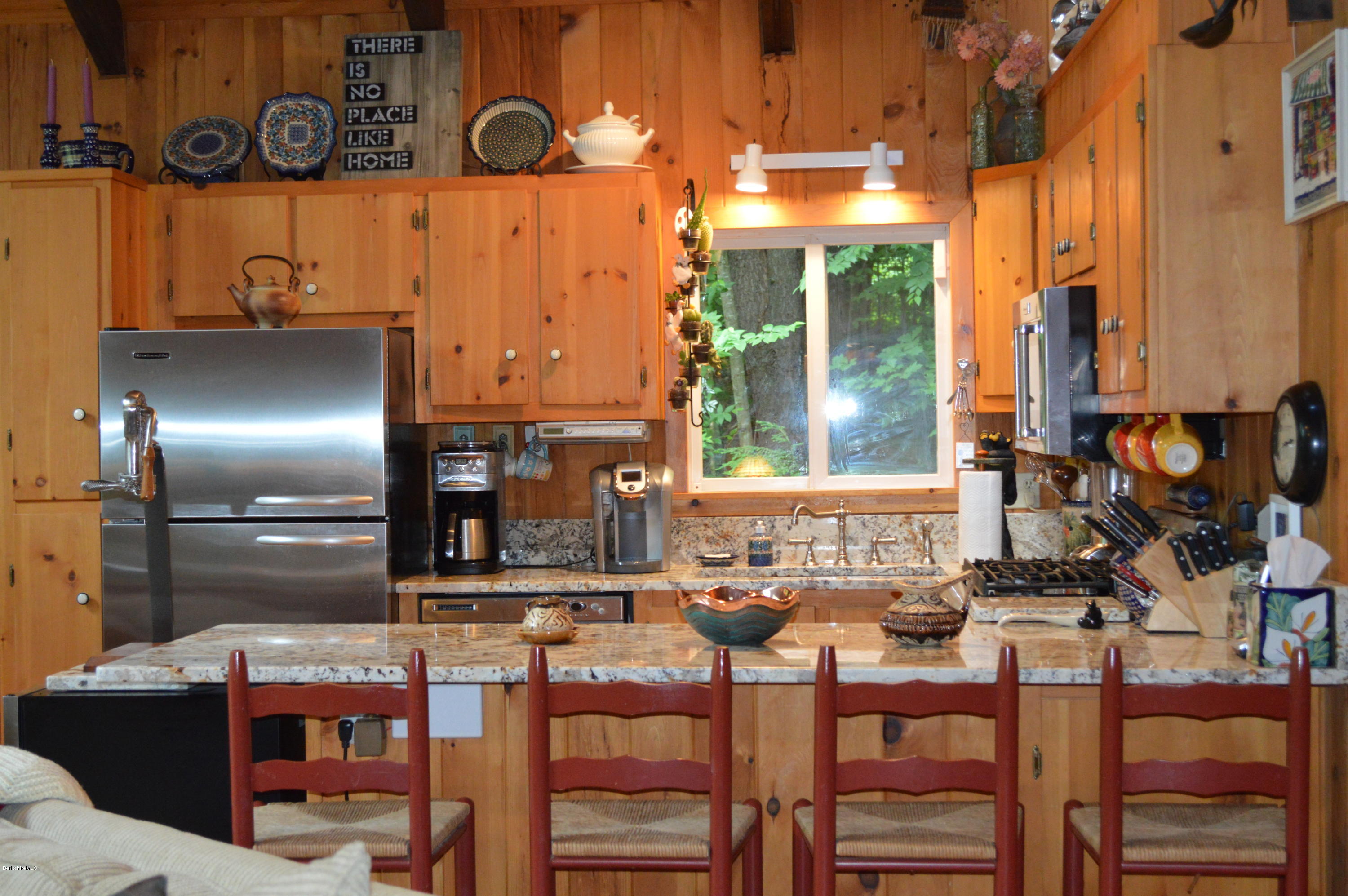 325 Bonny Rigg Hill Road Becket, MA 01223 - Photo 21 of 47 a kitchen with a sink and cabinets
