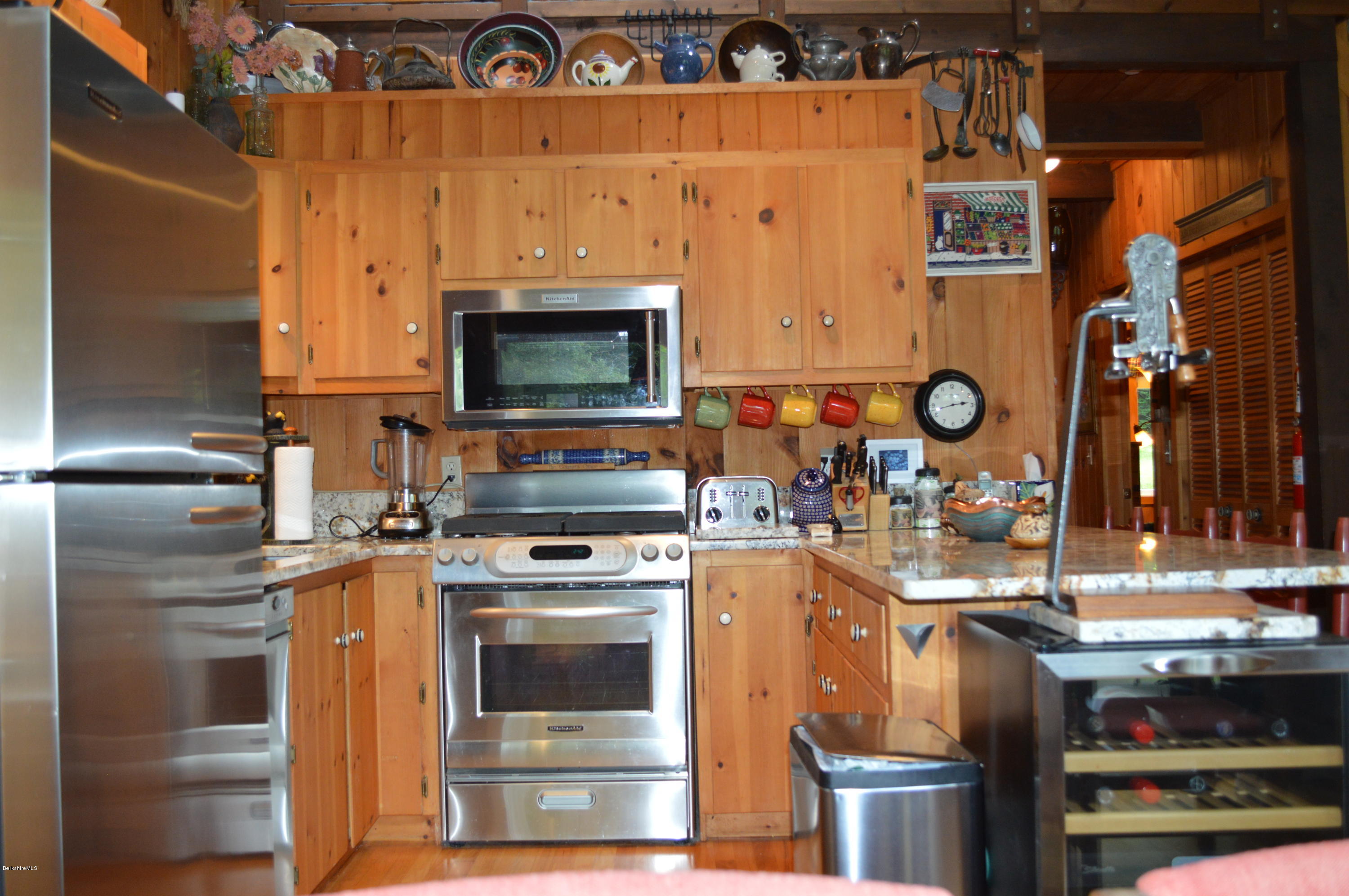 325 Bonny Rigg Hill Road Becket, MA 01223 - Photo 23 of 47 a kitchen with a stove and a sink