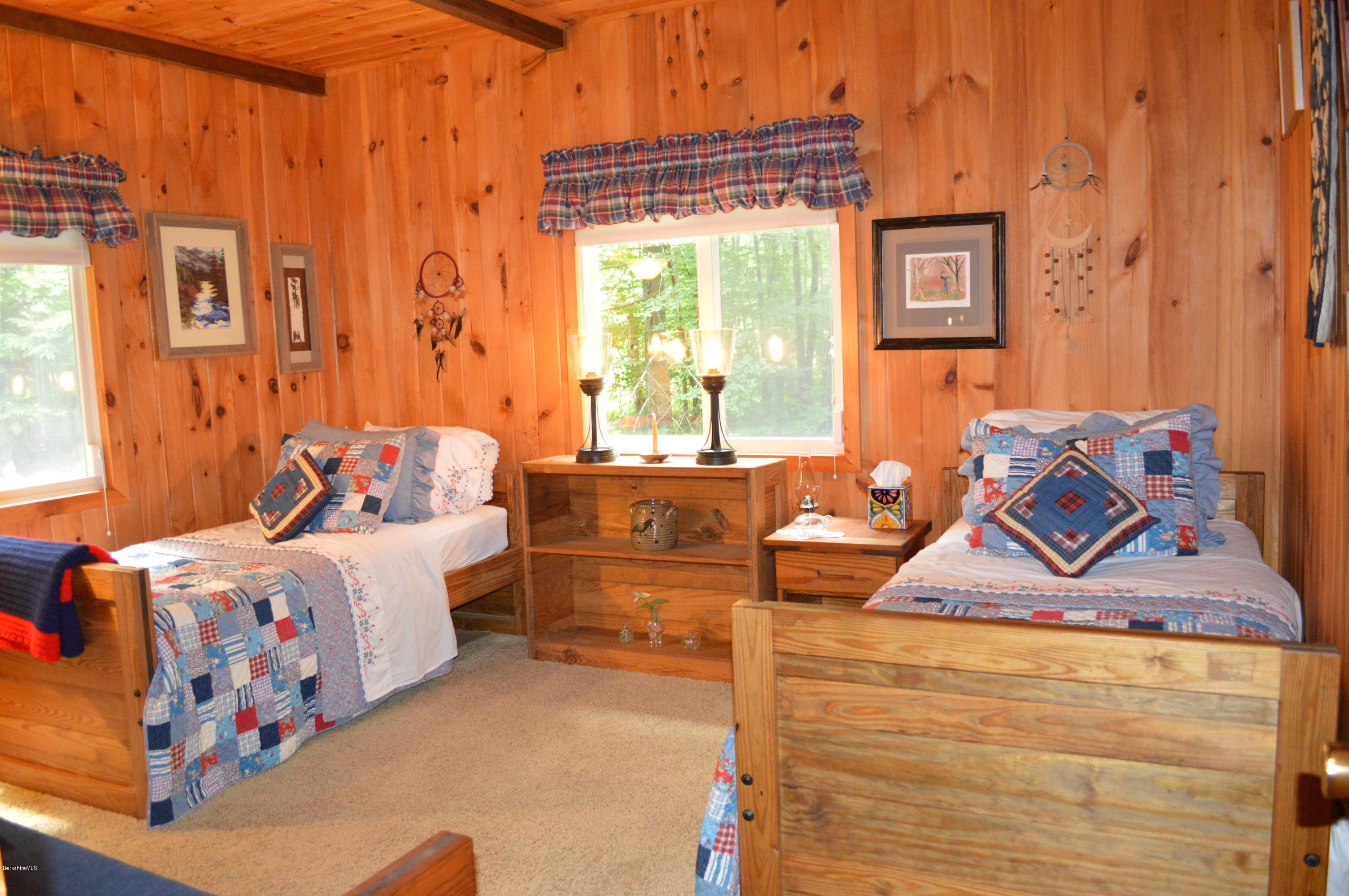 325 Bonny Rigg Hill Road Becket, MA 01223 - Photo 27 of 47 a bedroom with furniture and a window