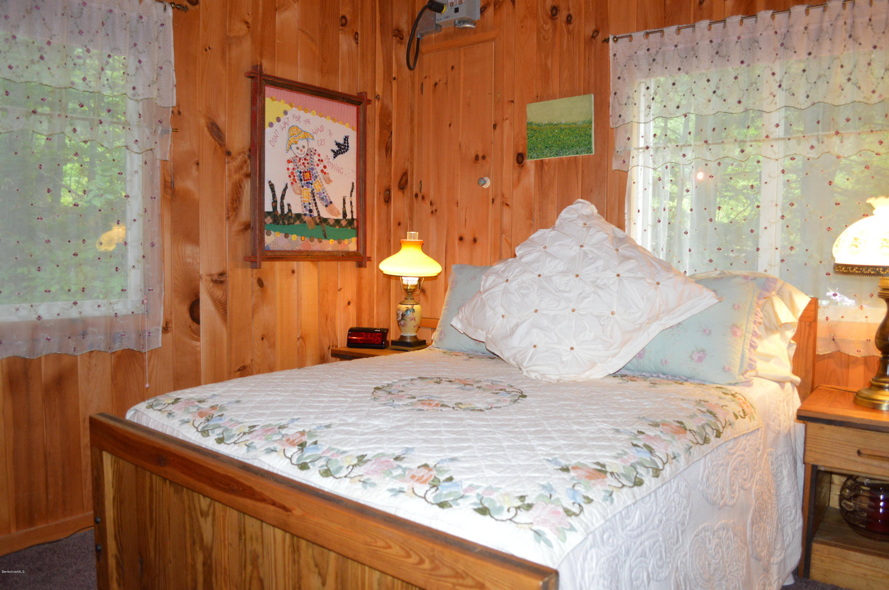 325 Bonny Rigg Hill Road Becket, MA 01223 - Photo 29 of 47 a bedroom with a bed and a window