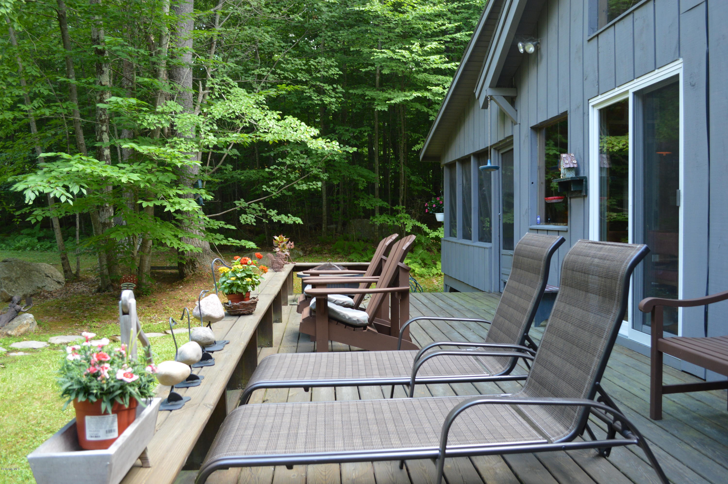 325 Bonny Rigg Hill Road Becket, MA 01223 - Photo 44 of 47 a view of a chairs and table in the balcony