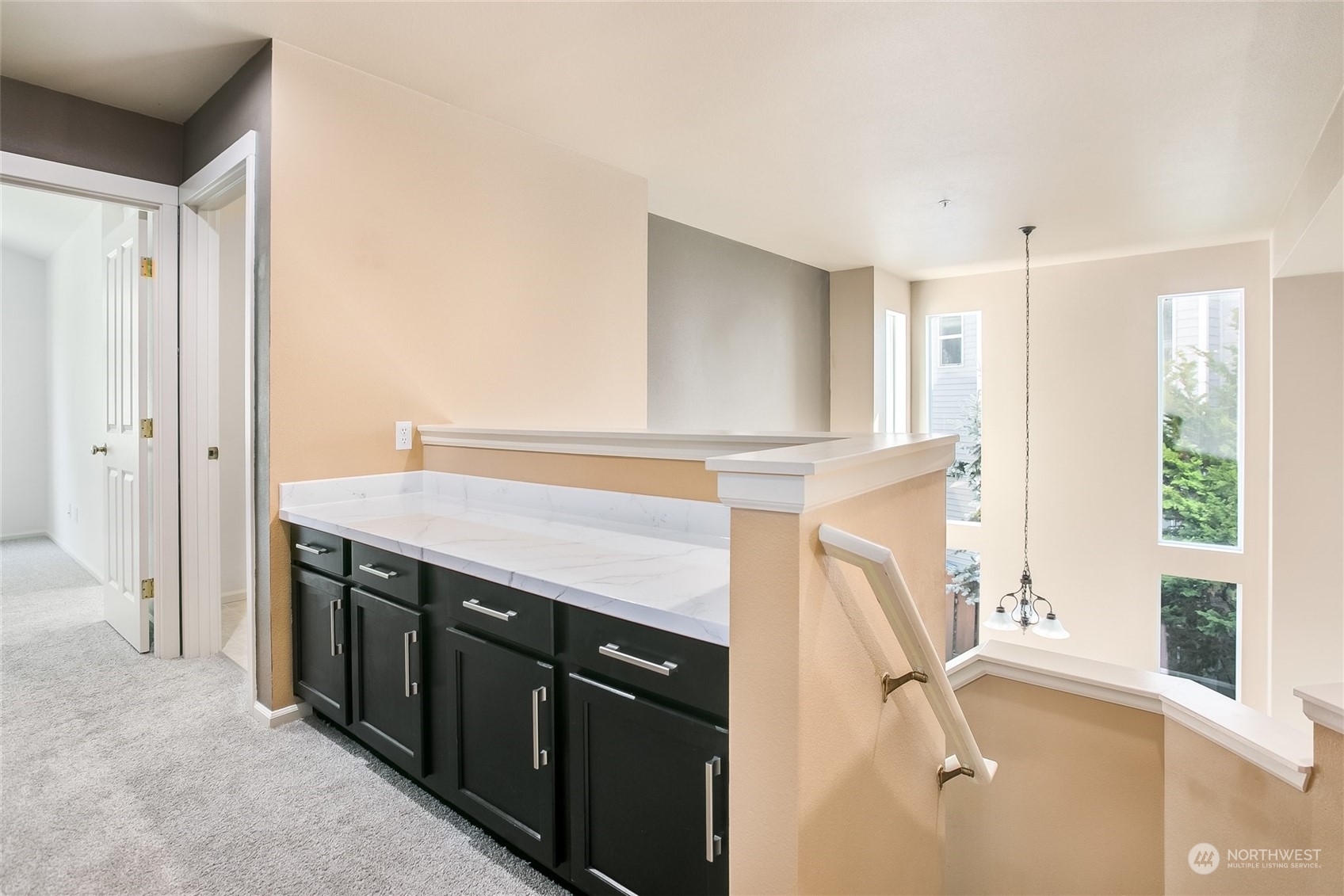 4109 South 220th Place, Unit 18 Kent, WA 98032 - Photo 13 of 29 a view of a kitchen with a sink and dishwasher a oven with wooden floor
