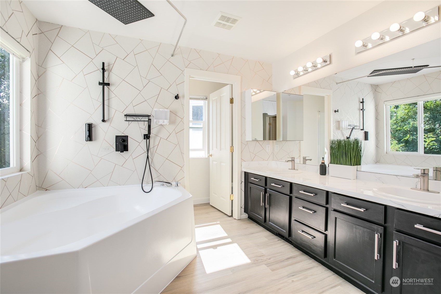 4109 South 220th Place, Unit 18 Kent, WA 98032 - Photo 15 of 29 a spacious bathroom with a double vanity sink mirror and shower