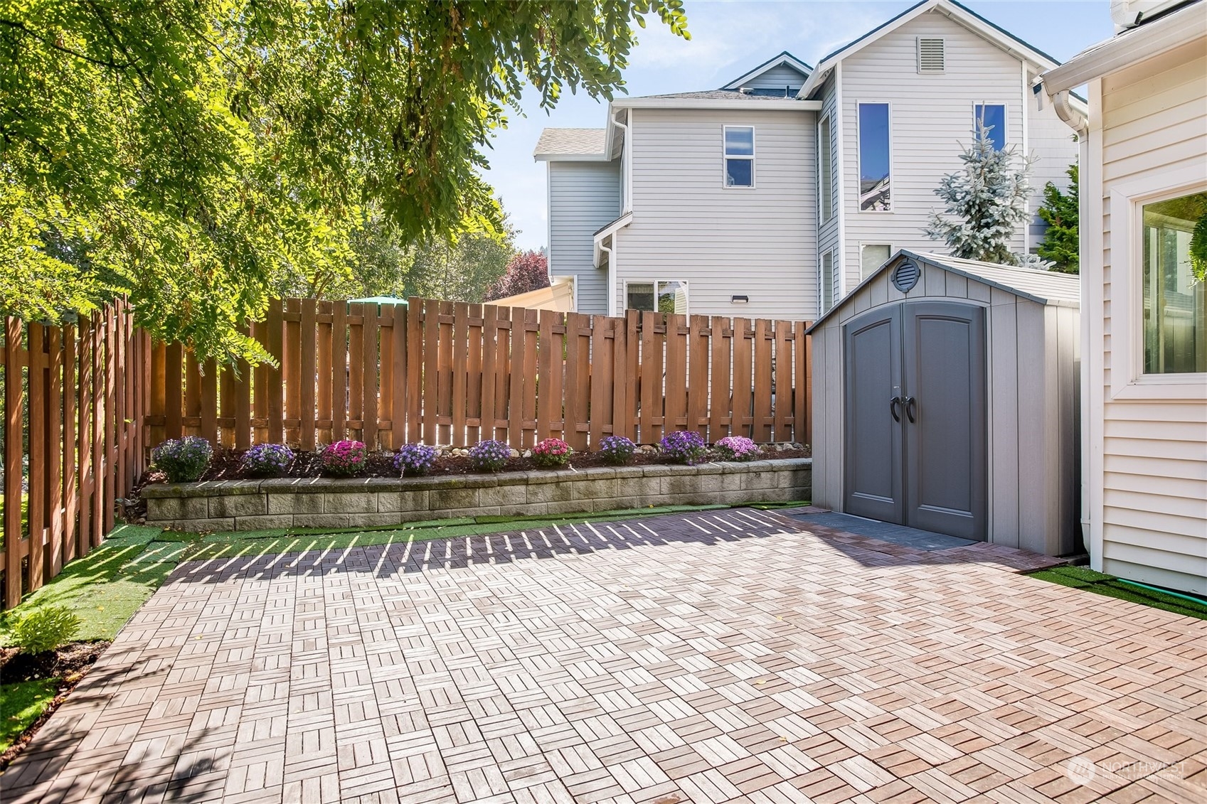 4109 South 220th Place, Unit 18 Kent, WA 98032 - Photo 24 of 29 a view of a back yard of the house