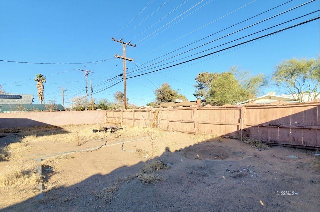 404 Lenore Street Ridgecrest, CA 93555 - Photo 23 of 30 a view of a backyard of the house
