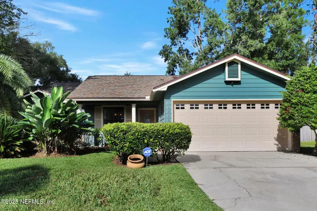 a view of a house with garden