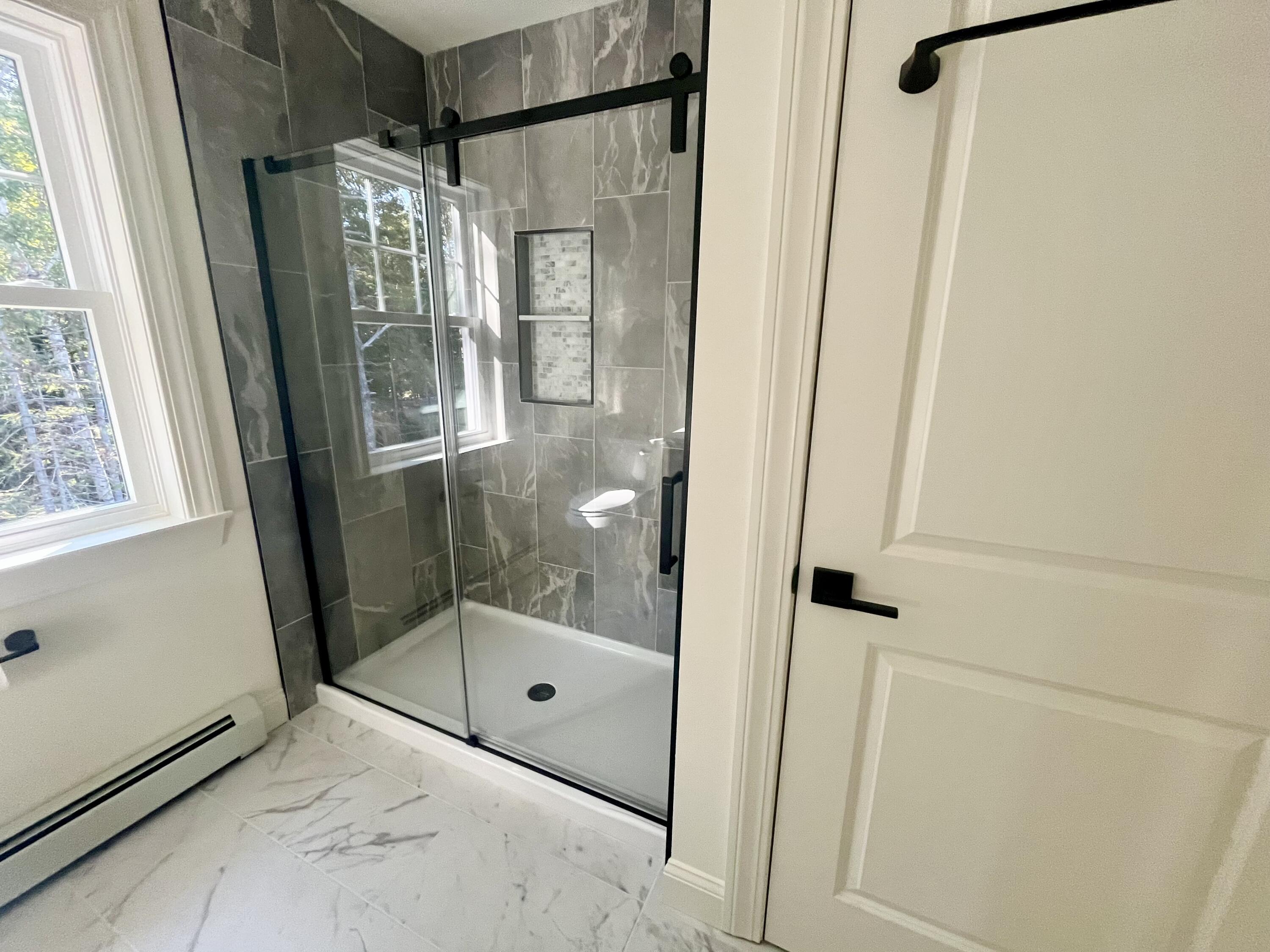 12 Windsor Way Ellsworth, ME 04605 - Photo 27 of 53 Primary shower and linens