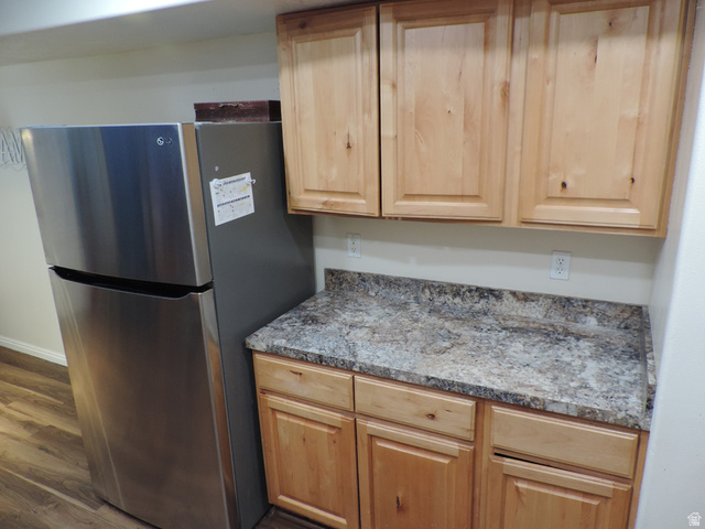 8198 North Cedar Springs Road, Unit 5 Eagle Mountain, UT 84005 - Photo 10 of 30 Kitchen - lots of storage, stainless steel appliances, LVP flooring