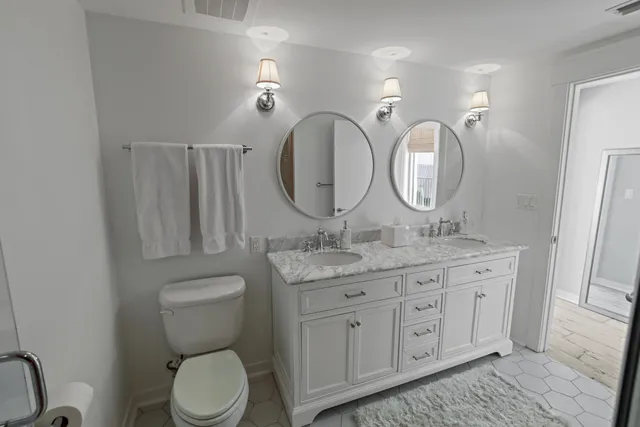 a view of a green field with an ocean view