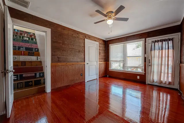 a kitchen with white cabinets and a sink