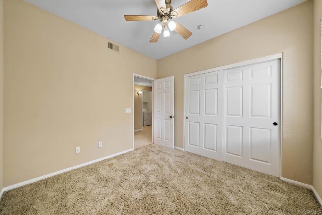 3223 Dehesa Road, Unit 32 El Cajon, CA 92019 - Photo 23 of 46 a view of an empty room and chandelier fan