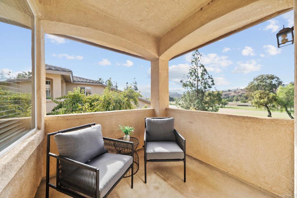 3223 Dehesa Road, Unit 32 El Cajon, CA 92019 - Photo 24 of 46 a view of a chairs and table in a balcony
