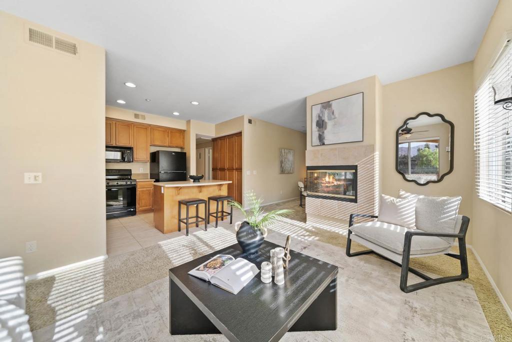 3223 Dehesa Road, Unit 32 El Cajon, CA 92019 - Photo 4 of 46 a living room with furniture and a flat screen tv