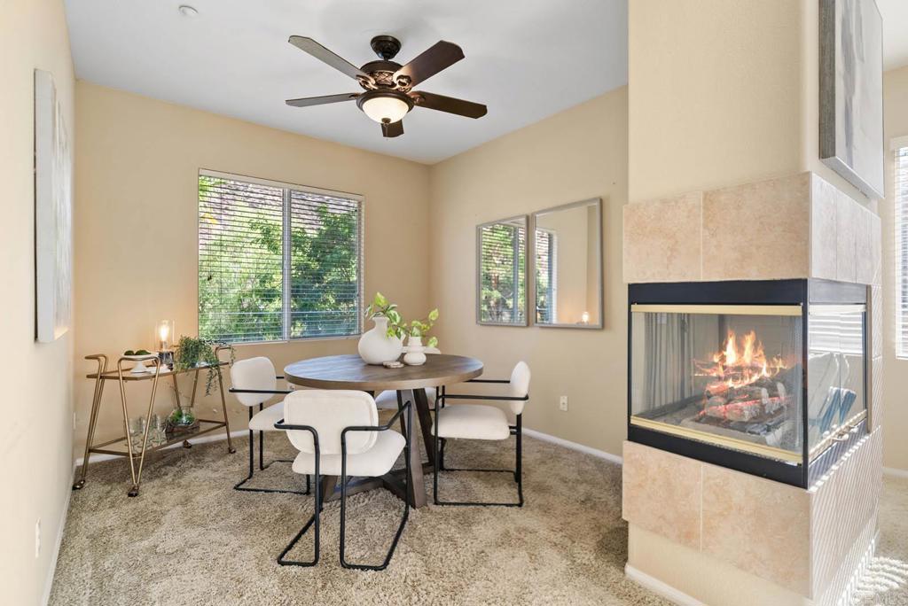 3223 Dehesa Road, Unit 32 El Cajon, CA 92019 - Photo 7 of 46 a view of a dining room with furniture a chandelier and a window