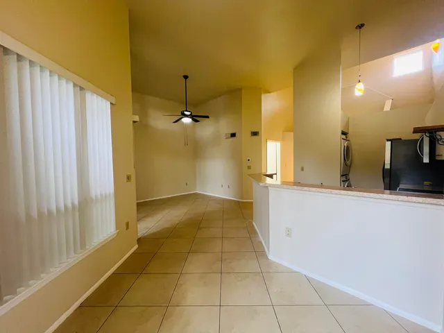 a view of a bathroom with a tub and a shower