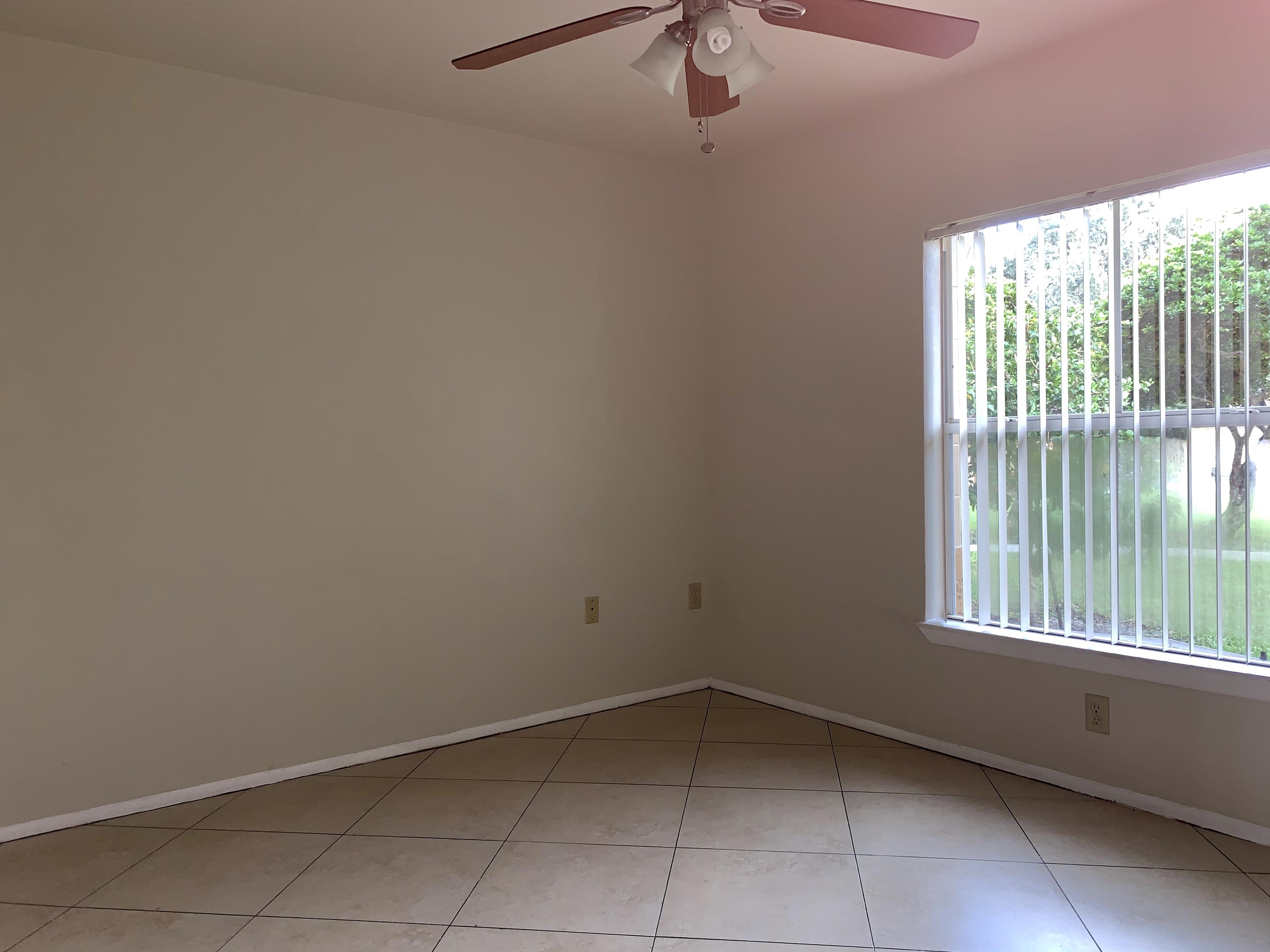 4799 Via Palm Lakes, Unit 1606 West Palm Beach, FL 33417 - Photo 15 of 29 a view of a room with a window