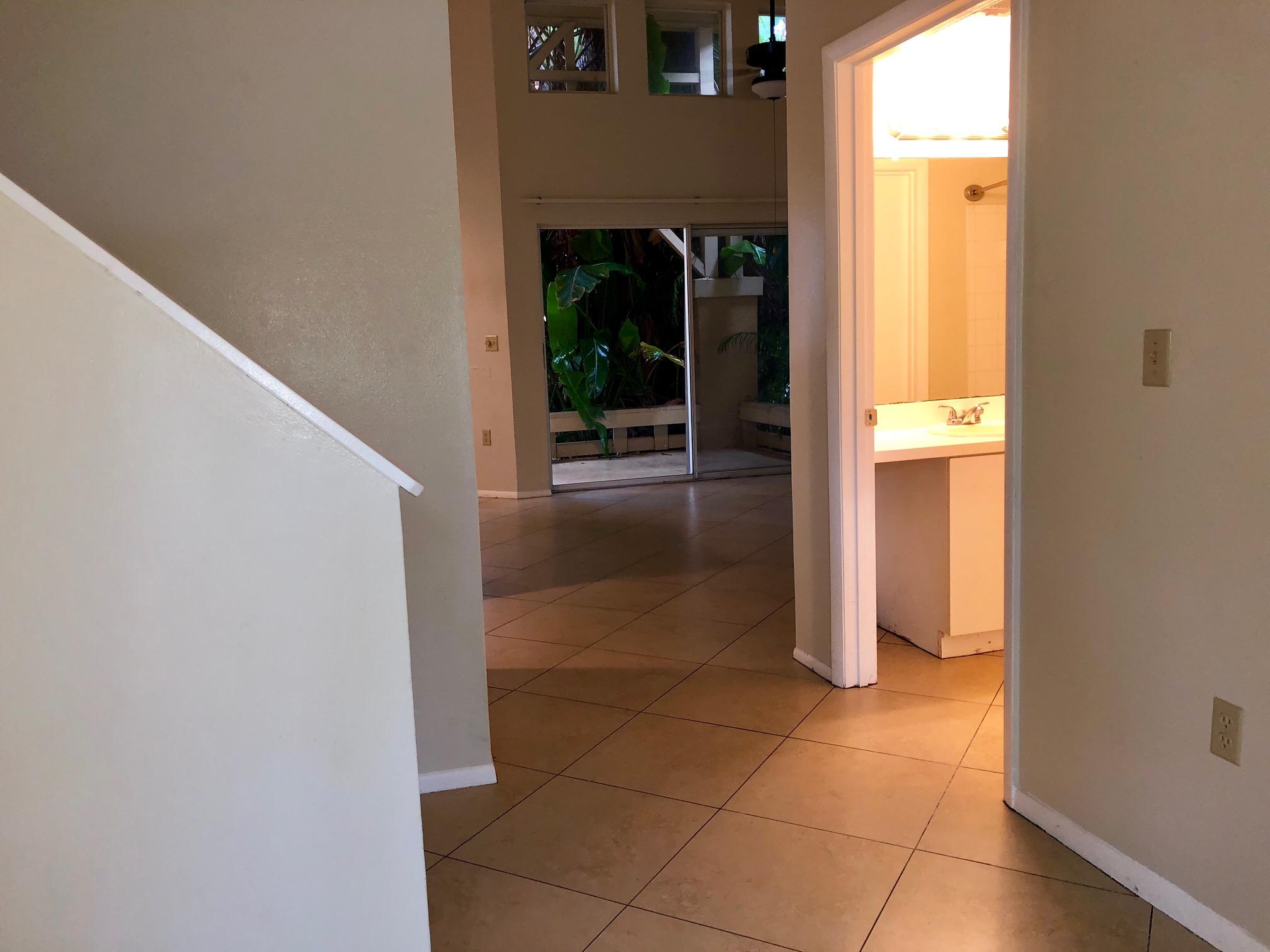4799 Via Palm Lakes, Unit 1606 West Palm Beach, FL 33417 - Photo 10 of 29 a view of a hallway view with an empty room and entrance