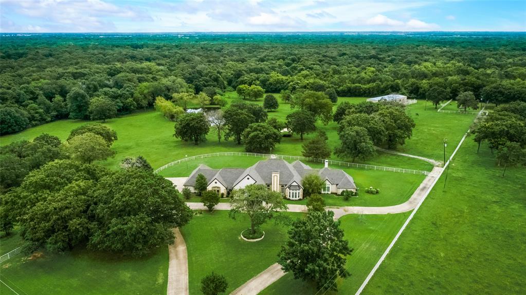 7794 Park Avenue Terrell, TX 75160 - Photo 1 of 1 a view of a golf ground with huge green field and trees all around