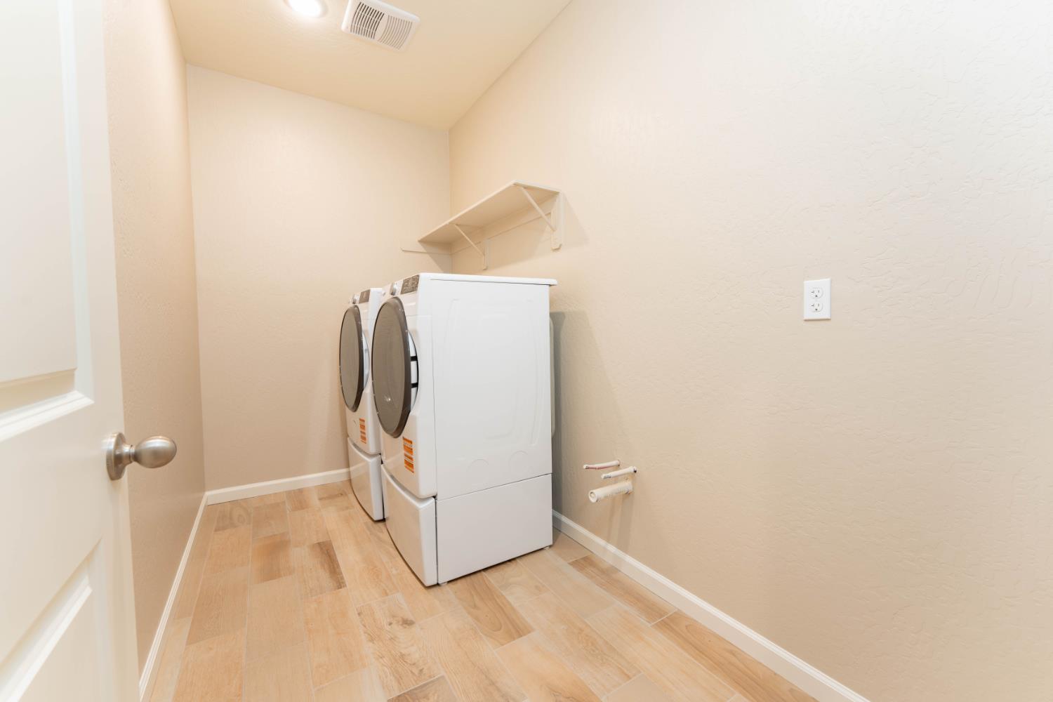 30480 Bellwood Road Visalia, CA 93291 - Photo 15 of 37 a view of a storage & utility room with a sink