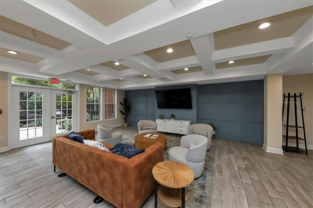 1408 Westchester Ridge Northeast Atlanta, GA 30329 - Photo 19 of 20 a living room with furniture and a flat screen tv
