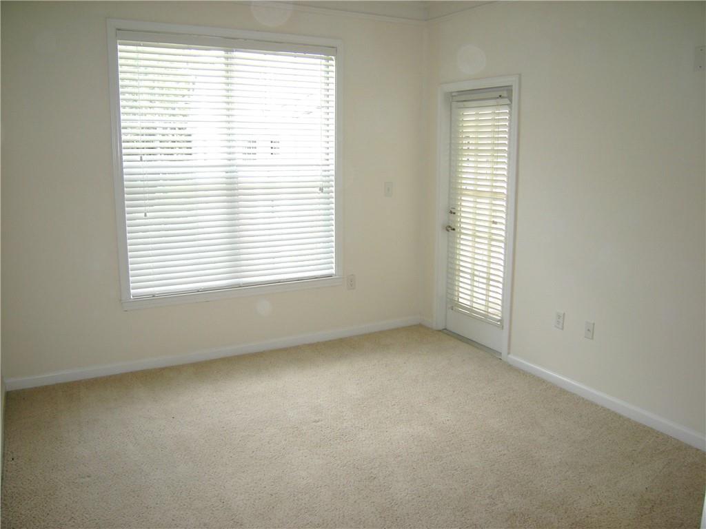 1408 Westchester Ridge Northeast Atlanta, GA 30329 - Photo 6 of 20 an empty room with a window