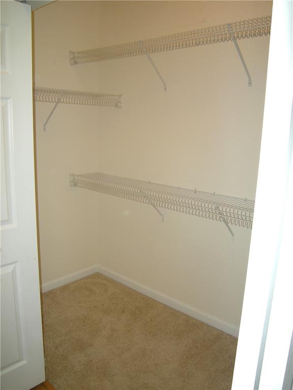1408 Westchester Ridge Northeast Atlanta, GA 30329 - Photo 7 of 20 a view of a room with racks on the wall
