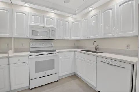 a view of a balcony and city view