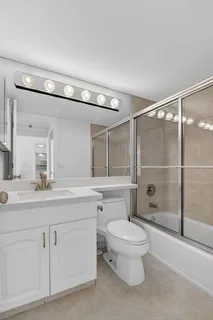 a view of a dining room with furniture and lots of furniture