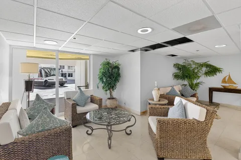 a kitchen with stainless steel appliances a stove a sink and a refrigerator