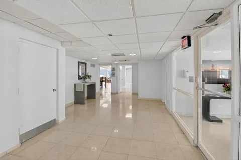 a view of a terrace with furniture and stove
