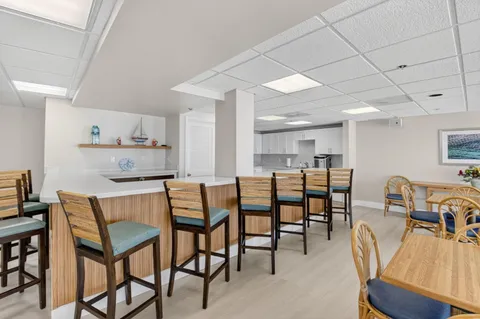a view of a terrace with furniture and a potted plant
